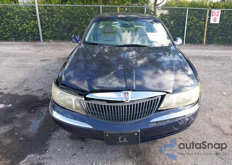 2001 Lincoln Continental из США, поврежденный, VIN 1LNHM97V41Y614240